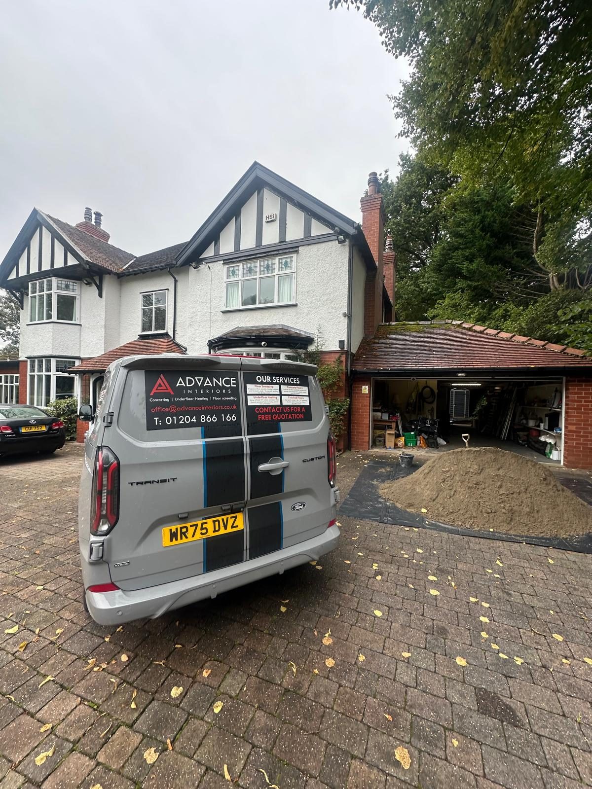 Advance Interiors van parked on the driveway outside the house in Bromley Cross with the screed delivered by the garage