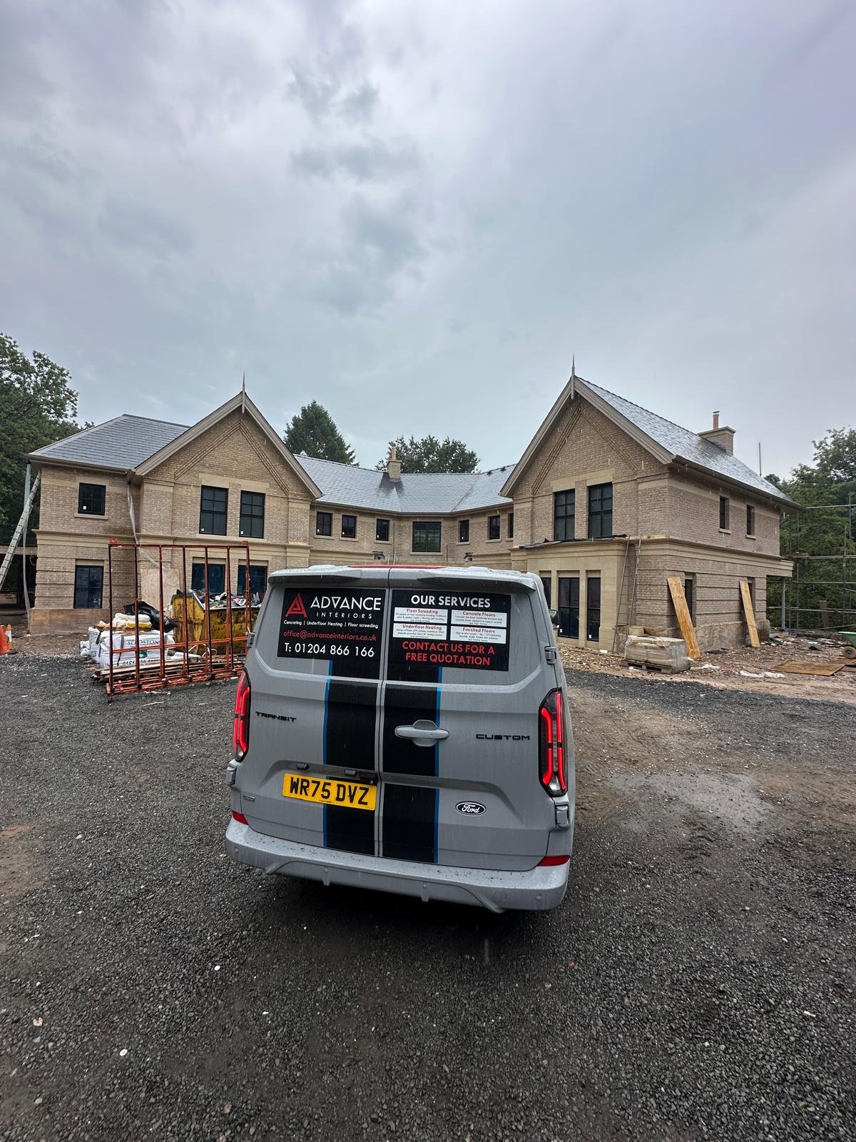 Advance Interiors van parked outside the new build in Hale