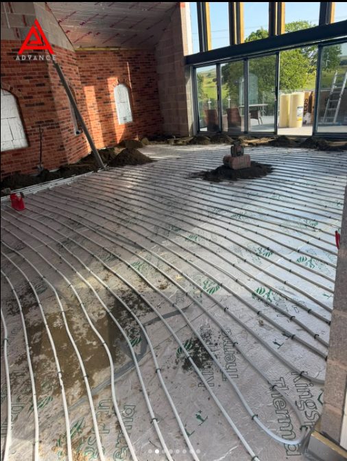 Underfloor heating pipework laid over insulation